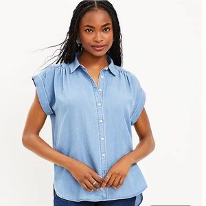 Beautiful denim shirt perfect for fall!!! Only work a couple times new condition